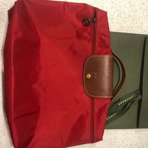 Long champ red brief case